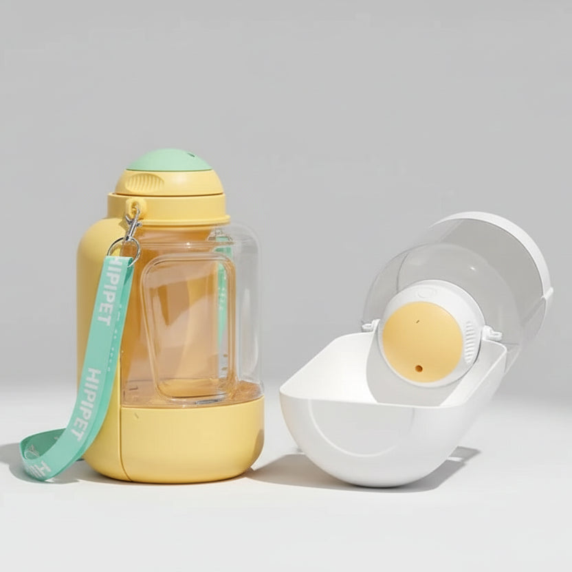 Gourde de voyage pour chien Oscar et Plume en jaune et blanc avec compartiment pour nourriture et sangle