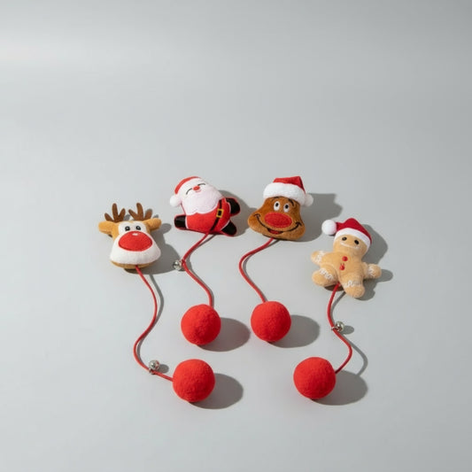Jouet de Noël pour chat avec quatre personnages festifs en peluche et pompons pour jouer