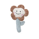 Jouet herbe pour chat en forme de fleur souriante avec des couleurs douces et texturée