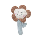 Jouet herbe pour chat en forme de fleur souriante avec des couleurs douces et texturée