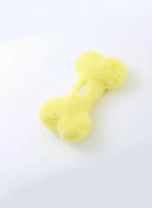 Jouet os en peluche pour chien de couleur jaune, doux et mesure environ 10 cm de long