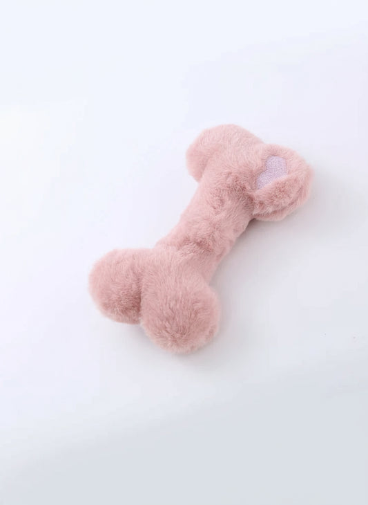 Jouet os en peluche pour chien de couleur rose, doux et de taille idéale pour le jeu