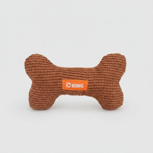 Jouet sonore pour chien en forme d'os de couleur marron pour le divertissement des animaux