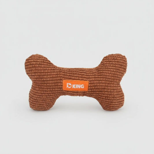 Jouet sonore pour chien en forme d'os de couleur marron pour le divertissement des animaux