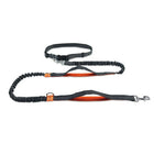 Laisse elastique pour chien de la marque Oscar et Plume noire avec poignées rembourrées orange