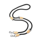 Laisse mains libres pour chien noire avec attaches métalliques et finitions en cuir beige