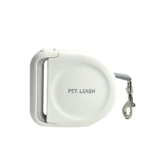 Laisse rétractable pour chien blanche avec poignée ergonomique de la marque Oscar et Plume