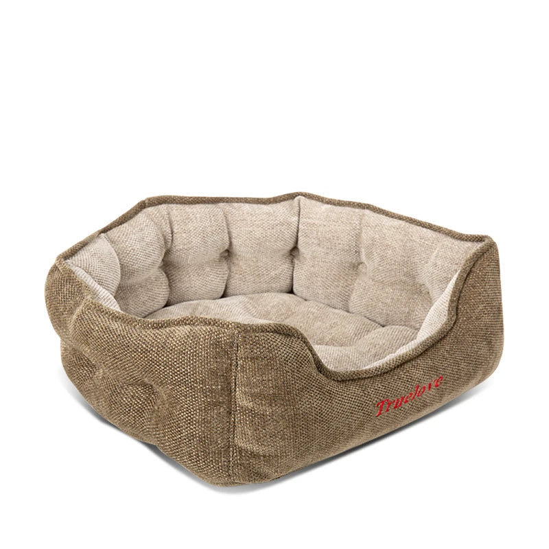 Lit pour chien très doux de couleur beige avec rebords rembourrés pour un confort optimal