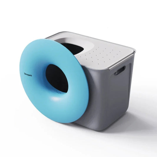 Litière design pour chat de Oscar et Plume avec un couvercle bleu en forme d'anneau