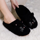 Oscar et Plume chaussons chat pour adulte noirs en peluche avec visage brodé et semelle antidérapante