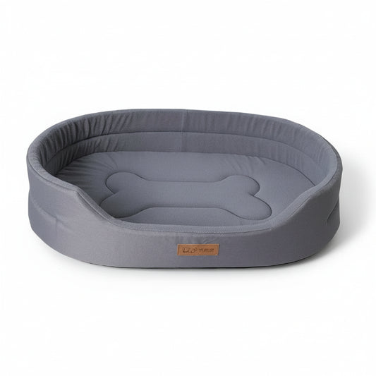 Panier lavable pour chien de chez Oscar et Plume en gris avec forme d'os pour le confort de votre animal
