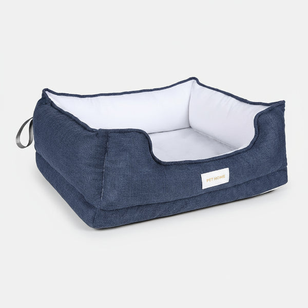 panier pour chien Oscar et Plume bleu marine en tissu avec coussin blanc amovible et bords rembourres