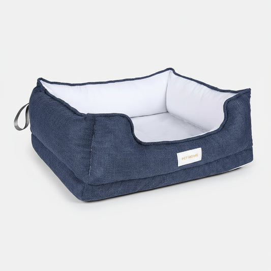 panier pour chien Oscar et Plume bleu marine en tissu avec coussin blanc amovible et bords rembourres