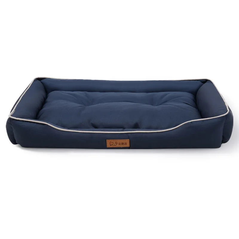 Panier pour chien confortable en tissu bleu avec rebords rembourrés pour le repos des animaux