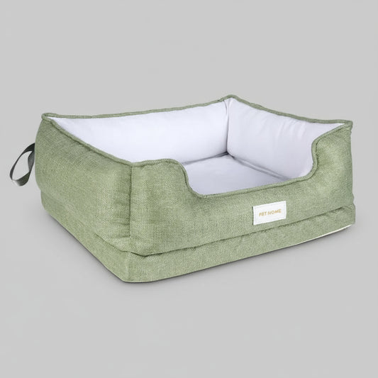 panier pour chien vert olive Oscar et Plume en tissu avec coussin blanc bords releves et poignee
