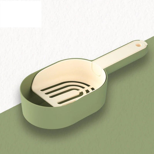 Pelle litière design Oscar et Plume beige et verte avec manche ergonomique