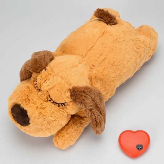 Peluche apaisante pour chien en forme de chien avec des yeux fermés et un doux pelage en orange