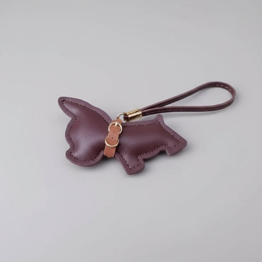 Porte clés bouledogue en cuir marron avec une lanière en cuir pratique