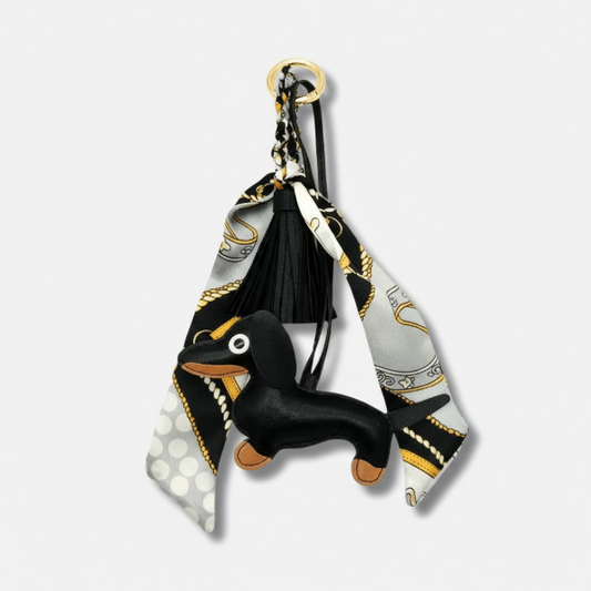 Porte-clés chien en forme de teckel avec un foulard élégant pour un style unique