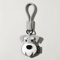 Load image into Gallery viewer, Porte-clés chien en cuir gris clair avec détail blanc et noir par Oscar et Plume
