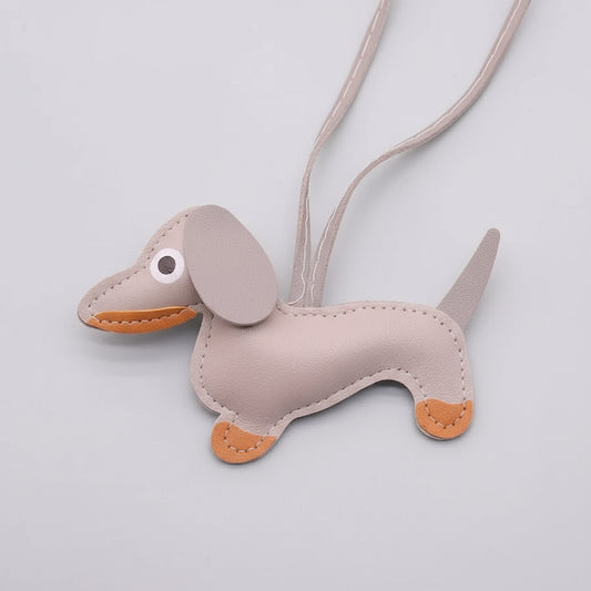 Porte-clés teckel cuir gris avec des détails orange pour les amoureux des chiens