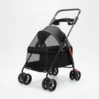 Poussette pour chien noire avec roues pivotantes et espace aéré en filet pour une bonne ventilation