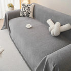 Housse de canapé grise Oscar et Plume offrant une protection canapé chat et chien avec un design moderne