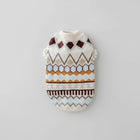 Pull chaud pour chien en maille avec motifs géométriques multicolores de la marque Oscar et Plume