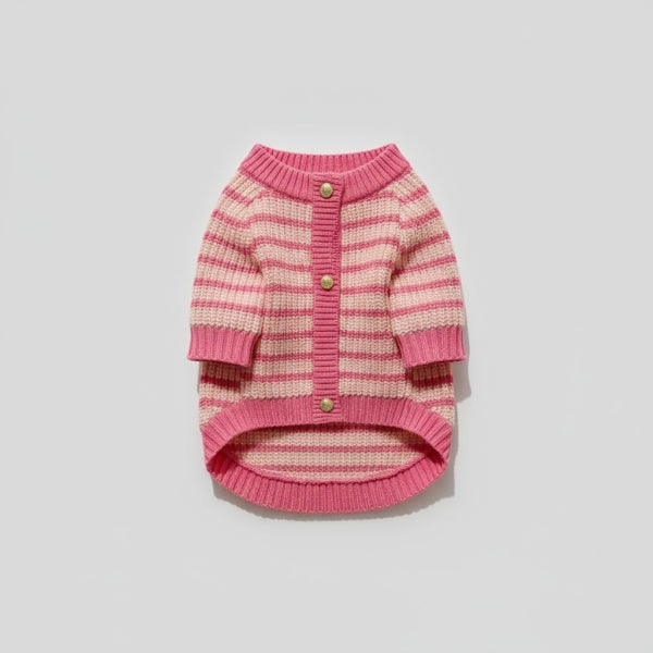 Pull tricoté pour chien en rose et crème avec des détails en tricot complexe