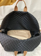 Intérieur du sac de transport pour chien en tissu matelassé avec doublure en beige