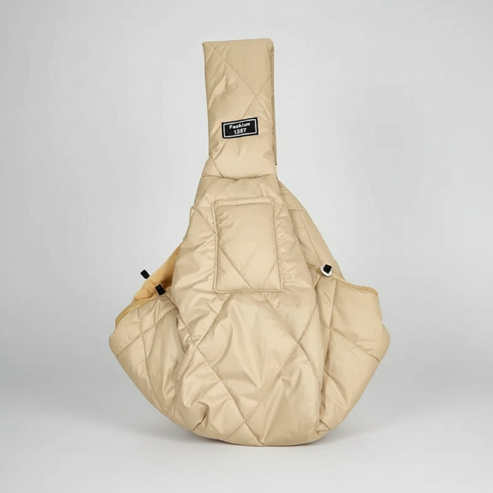 Sac de transport pour petit chien en tissu matelassé beige, idéal pour le confort et la sécurité