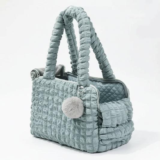 Sac de transport pour petit chien et chat en tissu matelassé bleu avec pompon décoratif