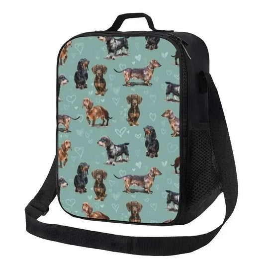 Sac isotherme design chien avec illustrations de teckels sur fond vert et sangle noire réglable