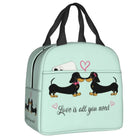Sac isotherme teckel avec design de chiens et inscription Love is all you need