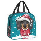 Sac isotherme teckel avec un design joyeux de chien portant un chapeau de Noël et un nœud papillon