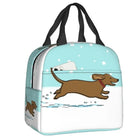 Sac isotherme teckel avec motif de chien courant dans la neige, parfait pour transporter vos repas