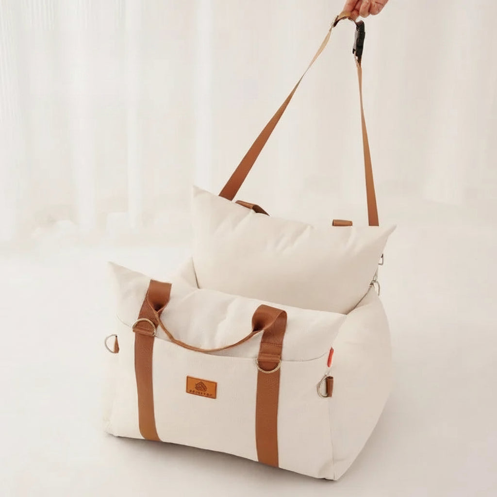 Sac voiture pour chat en tissu beige avec des poignées en cuir et un design confortable
