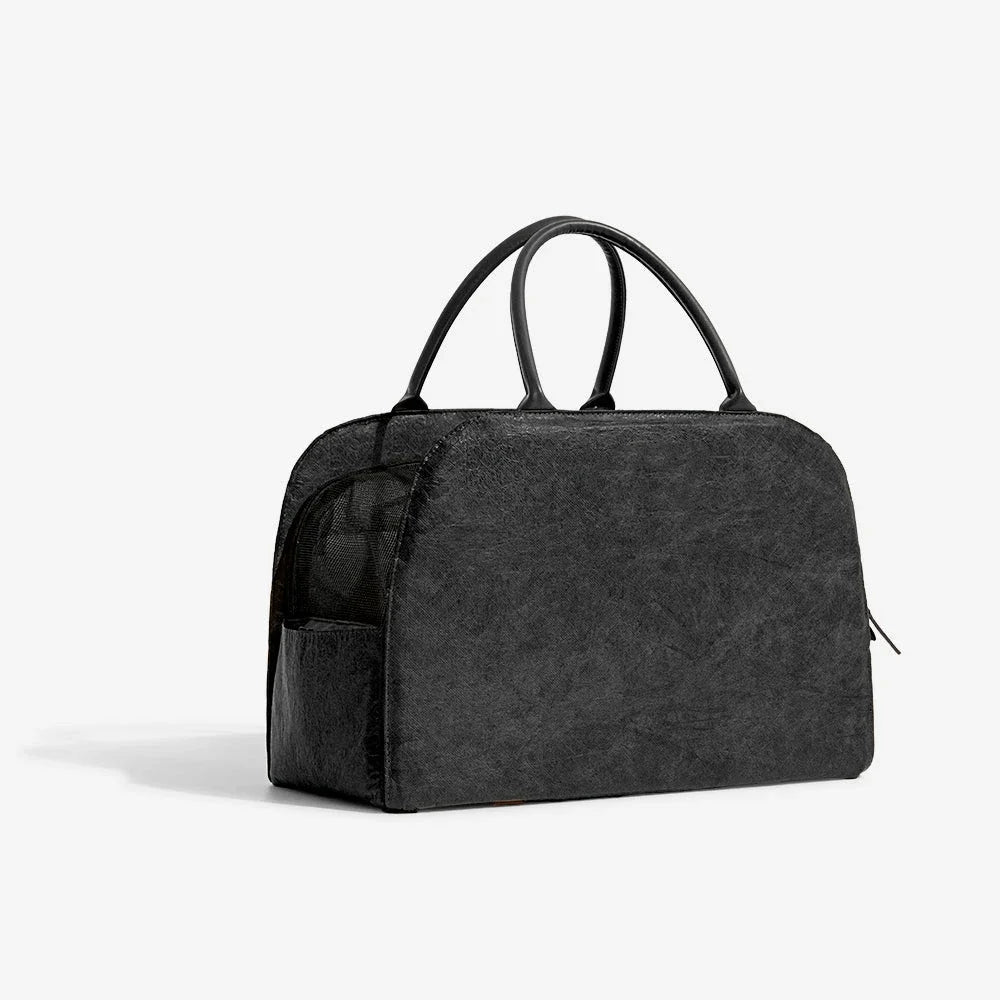 Sac voyage design petit chien noir avec poignées pour transporter un petit animal