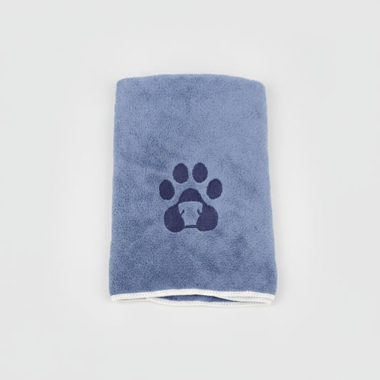 Serviette pour chien et chat bleue avec motif patte et bordure blanche par Oscar et Plume