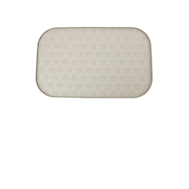 Tapis en silicone pour gamelle chien avec un motif de pattes antidérapant et facile à nettoyer