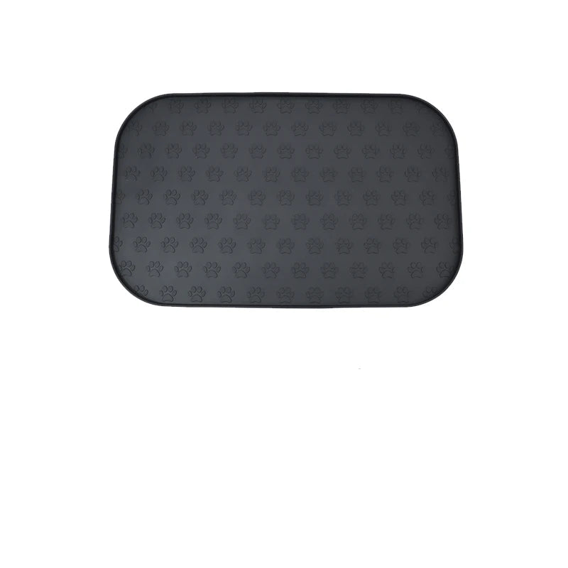 Tapis en silicone pour gamelle chien avec motif de pattes antidérapant, idéal pour les repas propres