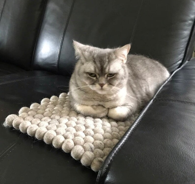 Tapis de fenêtre en laine mérinos Oscar et Plume